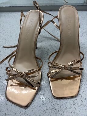 refuge Metallic Rose Gold Bow Strap Heels